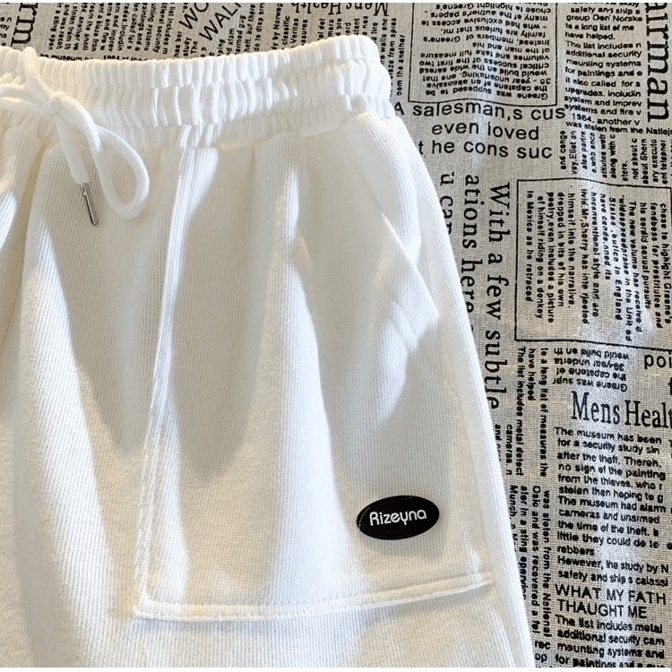 Fashionable wide women's shorts with large side pockets and drawstring, perfect for comfort and style. High waist, loose fit, blend fabric.
